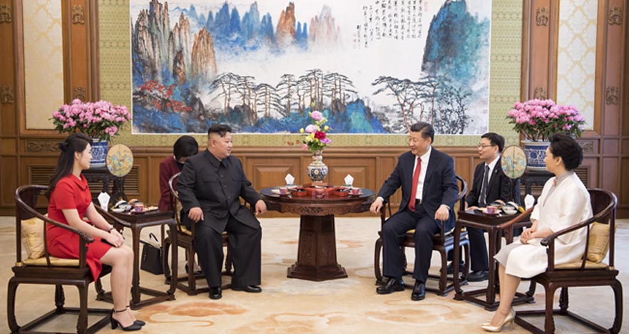 习近平会见朝鲜劳动党委员长金正恩
